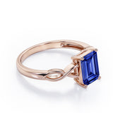 Solitaire 1 Carat Lab-Created Emerald Cut Sapphire Infinity Engagement Ring In White Gold