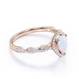 Twisted 1.45 Ct Pear Cut Lab Created Opal Engagement Ring