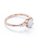 Tapered Six Prong 1.20 Carat Brilliant Round Cut Fiery Opal And Diamond Five Stone Engagement Ring In Rose Gold