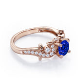 Four Prong 1.35 Carat Round Cut Sapphire and Diamond Vintage Milgrain Engagement Ring In Rose Gold