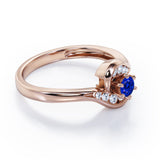Whirly Gemstone 0.55 carat Round Blue Sapphire and Moissanites Artistic Engagement Ring in White Gold