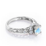 Modern Art Deco 1.15 Carat Round Cut Moonstone And Diamond  Four Prong Engagement Ring In White Gold