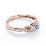 Trellis Three Stones 1 carat Princess Aquamarine and Moissanites Braided Engagement Ring in Rose Gold