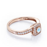 Flush-Prong Halo 1.25 Carat Round Cut Moonstone and diamond Milgrain-Edged Pave Channel Engagement Ring in White Gold