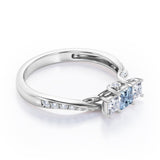 Scale Bridge Accent 0.65 carat Princess Aquamarine and Moissanite Twisted Wave Engagement Ring in Rose Gold
