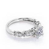Decorative Basket Prong 0.5 carat Round Moissanite and Diamond Nature-Inspired Ring in Rose Gold
