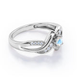 Distorted Unique Twisted Rope 0.6 carat Round Moonstone and Moissanites Promise Ring in Rose Gold