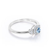Double Hearts 1.15 Carat Round Cut Aquamarine And Diamond Halo Engagement Ring In White Gold