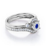Pave-Prong Design 0.55 TCW Round Shape Blue Sapphire and Moissanite Bridal Ring Set in Rose Gold