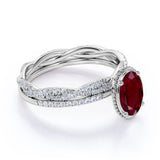 Stylish Infinity Design 1.50 Carat Oval Cut Lab Ruby and Diamond Bezel Wedding Ring Set in White Gold