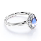 Massive 1.25 Carat Oval Dark Blue Moonstone and Diamond Halo Engagement Ring in Rose Gold
