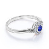 1.25 Carat Round cut Sapphire and Diamond Halo Engagement Ring in White Gold