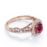 Antique Milgrain 1.35 Carat Round Cut Lab Ruby And Diamond Halo Engagement Ring In White Gold