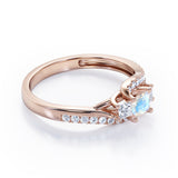 Trellis Three Stones 1 carat Princess Moonstone and Moissanites Braided Engagement Ring in Rose Gold