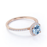 1.50 Carat Round cut Aquamarine and Diamond Halo Engagement Ring in Rose Gold