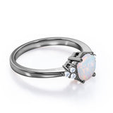 Seven Stone 1.25 Carat Round Cut Natural Opal And Diamond Tapered Engagement Ring In White Gold.
