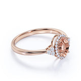 Four Prong 1.15 Carat Oval Cut Morganite and Six Stone Diamond Engagement Ring in Rose Gold