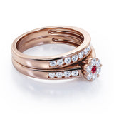 Flower Cluster Design 0.5 TCW Round-Shaped Ruby and Moissanite Flush-Channel Bridal Ring Set in Rose Gold