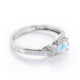 Trellis Three Stones 1 carat Princess Moonstone and Moissanites Braided Engagement Ring in Rose Gold
