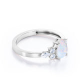 Four Prong Basket Set 1.35 Carat Pear Cut Ethiopian Opal And Diamond Seven Stone Engagement Ring In White Gold