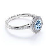 1.25 Carat Round cut Aquamarine and Diamond Halo Engagement Ring in Rose Gold