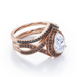 Milgrain Halo-Style 1.75 TCW Pear Cut Moissanite with Lab Created Black Diamond Pave Channel Wedding Ring Set in Black Gold