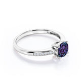 Simple Four Prong 1.25 Carat Round Cut Lab Created Alexandrite And Diamond Channel Set Engagement Ring In White Gold