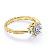 Tapered Classic 0.55 carat Round Moissanite and Diamond Engagement Ring in White Gold