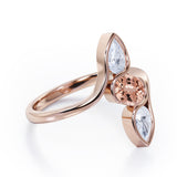 Distorted Line Three Stone 1 carat Oval and Pear Morganite and moissanite Ring in Rose Gold