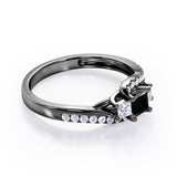Trellis Three Stones 1 carat Princess Black Diamond Braided Engagement Ring in Rose Gold