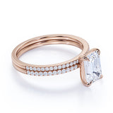 1.50 Carat emerald cut Moissanite and Diamond Halo Bridal Set in 10k Rose Gold