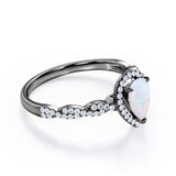 Twisted 1.45 Ct Pear Cut Lab Created Opal Engagement Ring