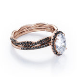 Four-Prong Halo 1.75 TCW Oval-Shaped Moissanite with Lab Created Black Diamond Pave Twisted Eternity Bridal Set in White Gold