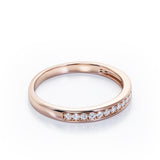 Classic 0.15 TCW Round Brilliant Cut Diamond Pave-Channel Design Wedding Band in 10K Yellow Gold