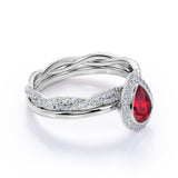 Classic Infinity Style 1.50 Carat Pear Shape Lab Ruby and Diamond Halo Wedding Ring Set in White Gold