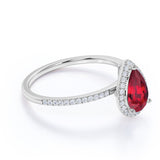 Elegant Pave 1.50 Carat Pear Shape Lab Ruby and Diamond Halo Engagement Ring in White Gold