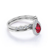 Timeless Milgrain 1.50 Carat Pear Cut Lab Ruby and Diamond Halo Wedding Ring Set in White Gold