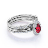 Elegant Pave 2.50 Carat Pear Shape Lab Ruby and Diamond Halo Trio Wedding Ring Set in White Gold