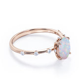 Sharp Four Claws 1.10 Carat Oval Cut Fire Opal And Diamond Seven Stone Engagement Ring In White Gold