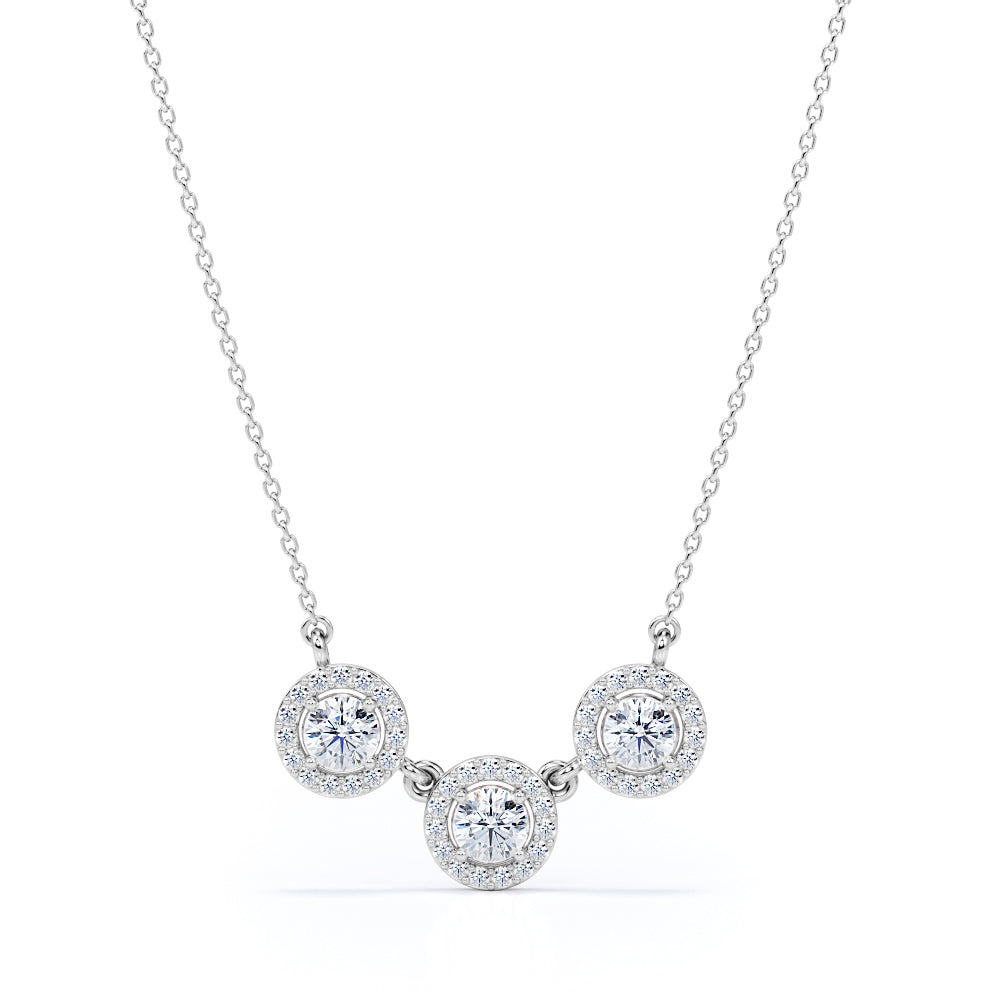 Trilogy 1 Carat Round Cut Moissanite And Diamond Three Stone Halo Pendant Necklace In Rose Gold