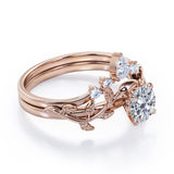 Fairytale 0.55 carat Round Moissanite and Diamond Wedding Ring Set in Black Gold