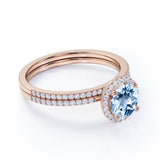 Antique Style 1.75 Carat Round Brilliant Cut Aquamarine and Diamond Halo Bridal Ring set in White Gold