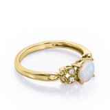 Tiny Butterfly 0.5 carat Round Opal and Diamond Vintage Engagement Ring in Rose Gold