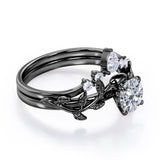 Fairytale 0.55 carat Round Moissanite and Diamond Wedding Ring Set in Black Gold