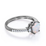 Hexagon Set 1.35 Carat Brilliant Round Ethiopian Opal And Diamond Pave Engagement Ring In White Gold.