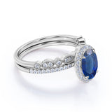 Antique Design 2 Carat Oval Cut Sapphire and Diamond Halo Wedding Set with Art Deco Band in White Gold