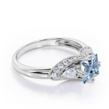 Vintage Eight Prongs 1.30 Carat Princess Cut Aquamarine And Diamond Marquise Framed Beaded Engagement Ring In White Gold