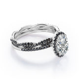 Four-Prong Halo 1.75 TCW Oval-Shaped Moissanite with Lab Created Black Diamond Pave Twisted Eternity Bridal Set in White Gold