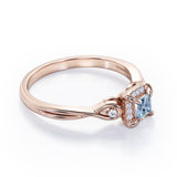 Prong and Halo 0.6 carat Princess Aquamarine and Moissanite Twisted Shank Engagement Ring in White Gold