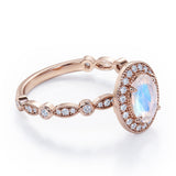 Antique Art Deco 1.35 Carat Oval Cut Moonstone And Diamond Halo Engagement Ring In White Gold